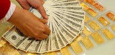 Vàng và USD đồng loạt lao dốc